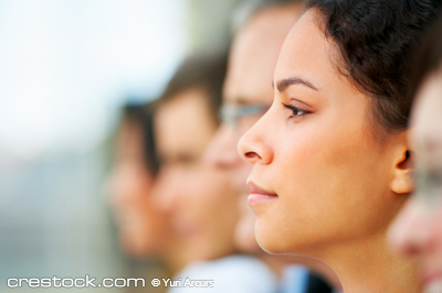 Close-up of a business woman at a conference, ...